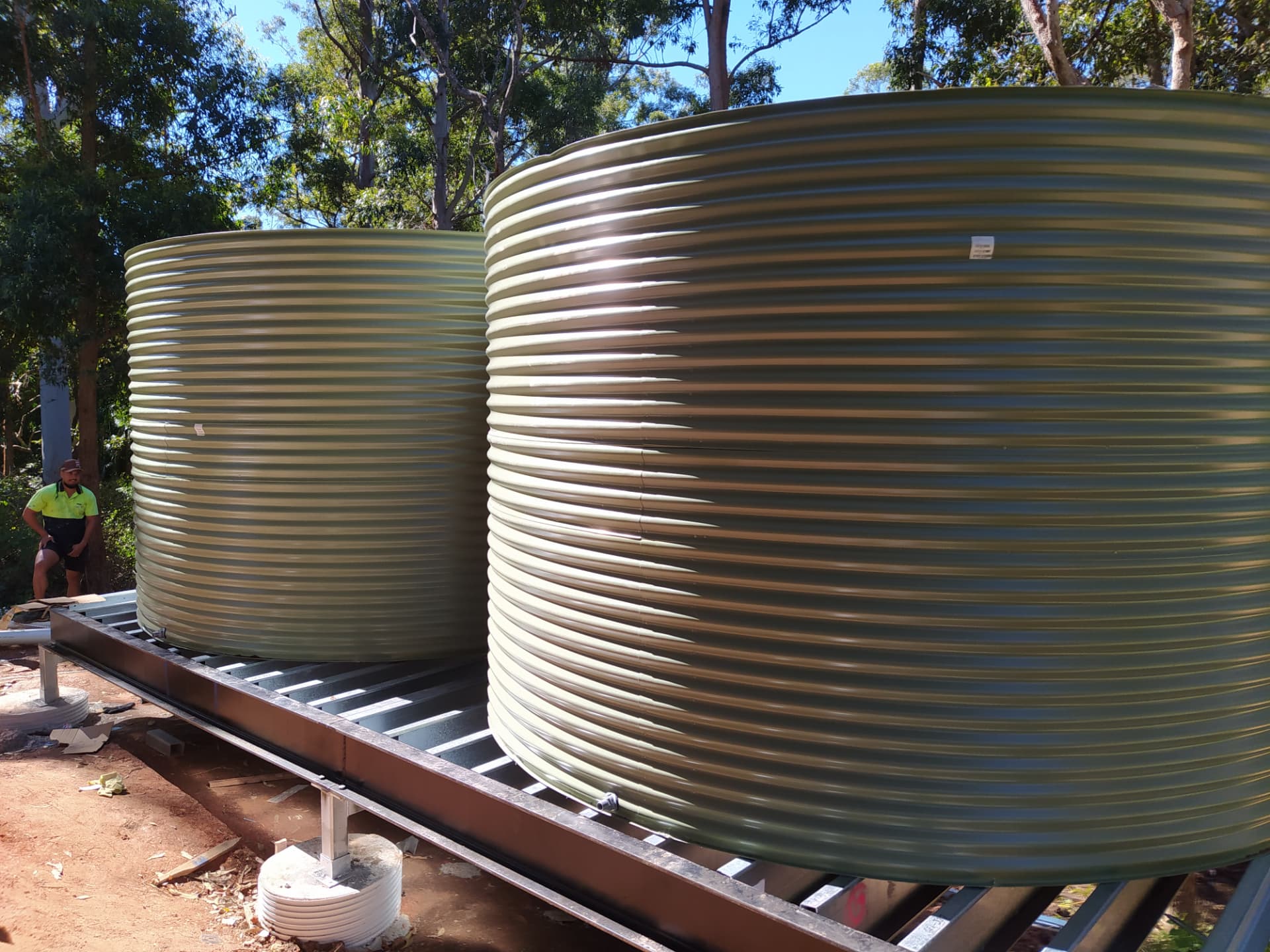 Deck build completion & twin 24,000L water tank install - after transformation photo