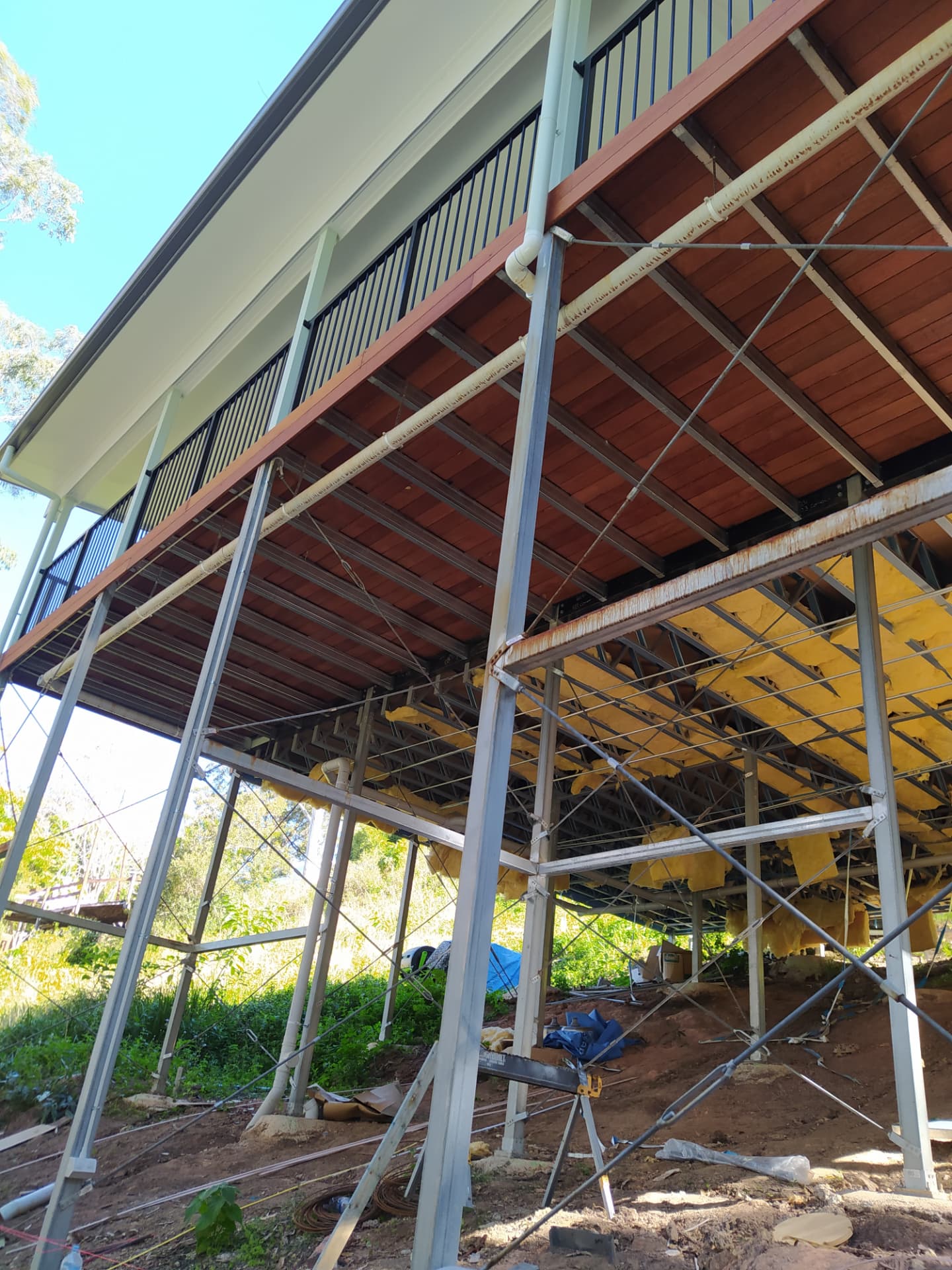 High-set house underfloor insulation install - after transformation photo
